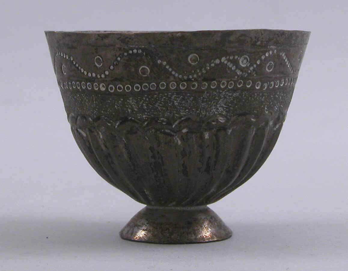 Cup and Holder, Cup: Porcelain; glazed and gold painted
Holder: Silver; repoussé