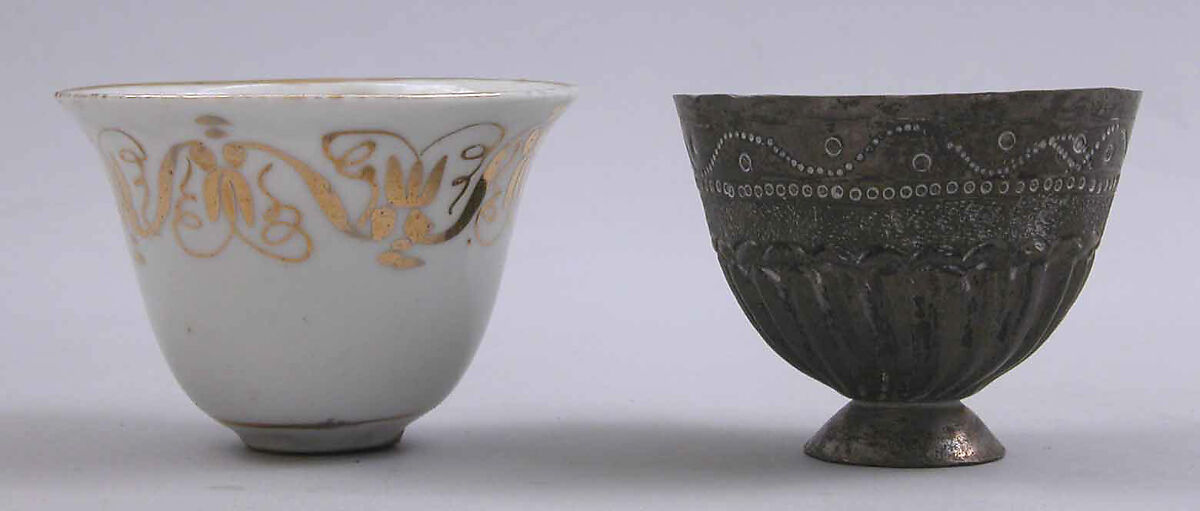 Cup and Holder, Cup: Porcelain; glazed and gold painted
Holder: Silver; repoussé 