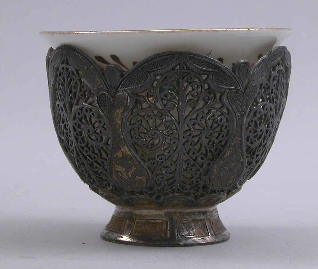 Cup and Holder, Cup: porcelain; glazed and painted
Holder: silver; pierced, engraved, and inlaid