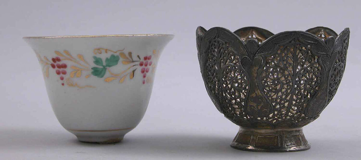 Cup and Holder, Cup: porcelain; glazed and painted
Holder: silver; pierced, engraved, and inlaid 