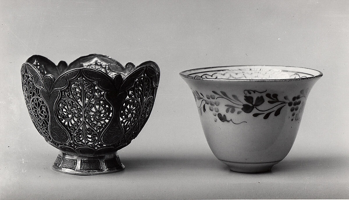 Cup and Holder, Cup: porcelain; glazed and painted
Holder: silver; pierced, engraved, and inlaid