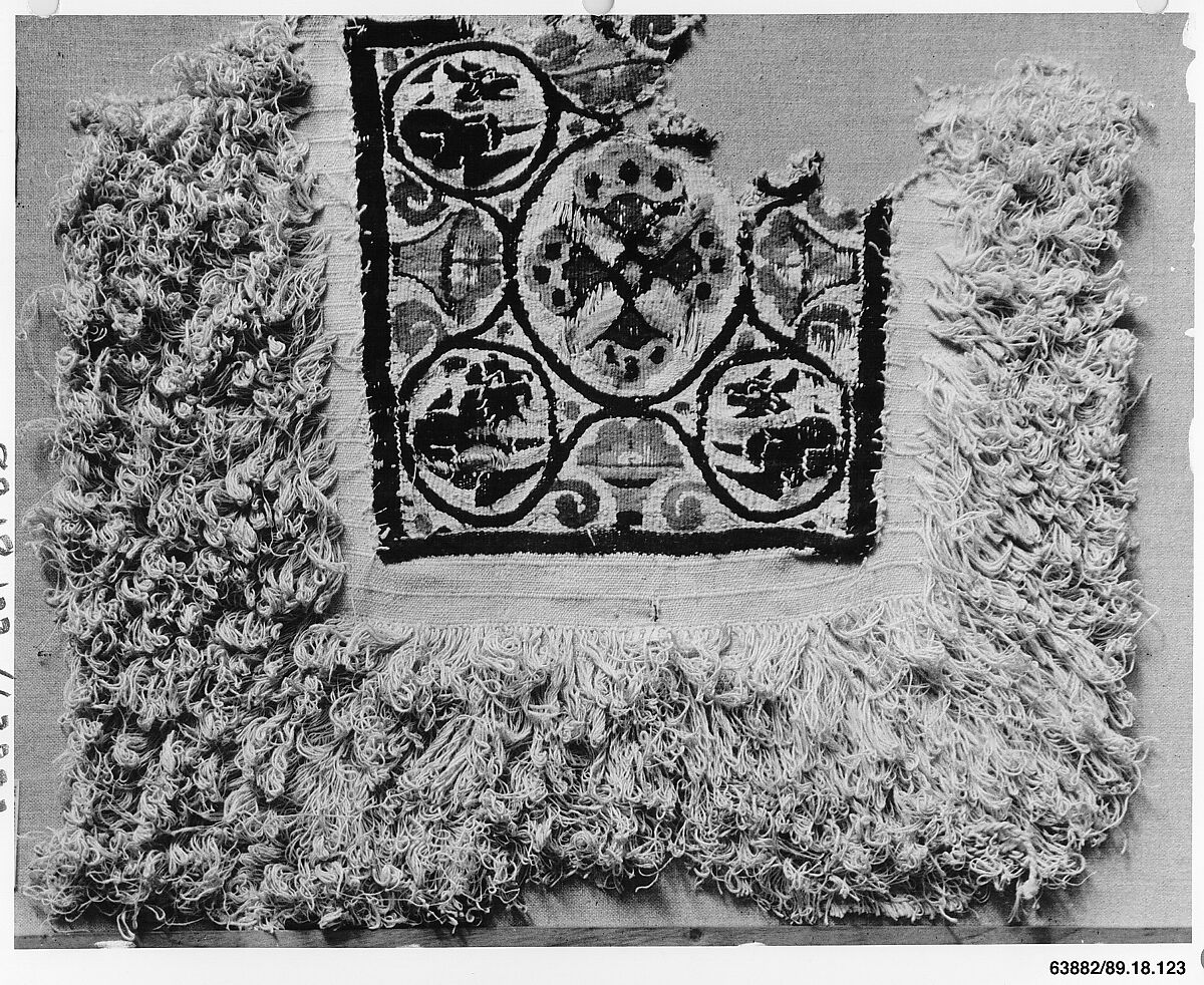 Fragment of a Cover or Blanket with Ornamental Square Featuring Flowers and Animals, Wool, linen; plain weave, tapestry weave, weft loop weave 