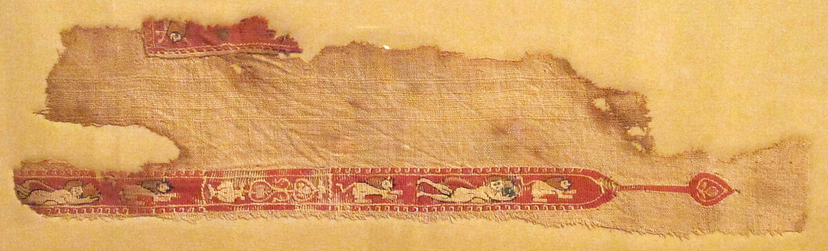 Tunic Fragment with Lions and Putti, Wool, linen; plain weave, tapestry weave