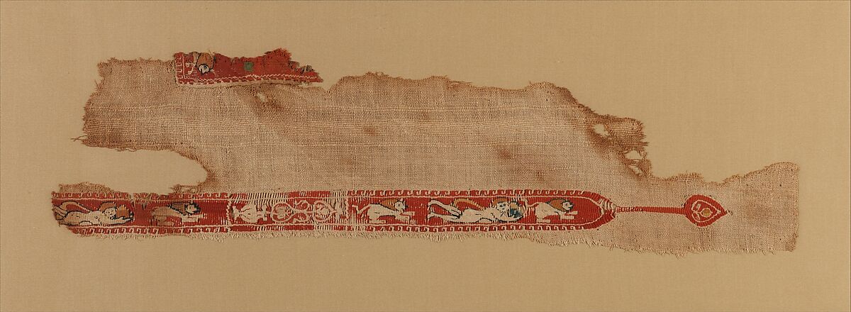 Tunic Fragment with Lions and Putti, Wool, linen; plain weave, tapestry weave