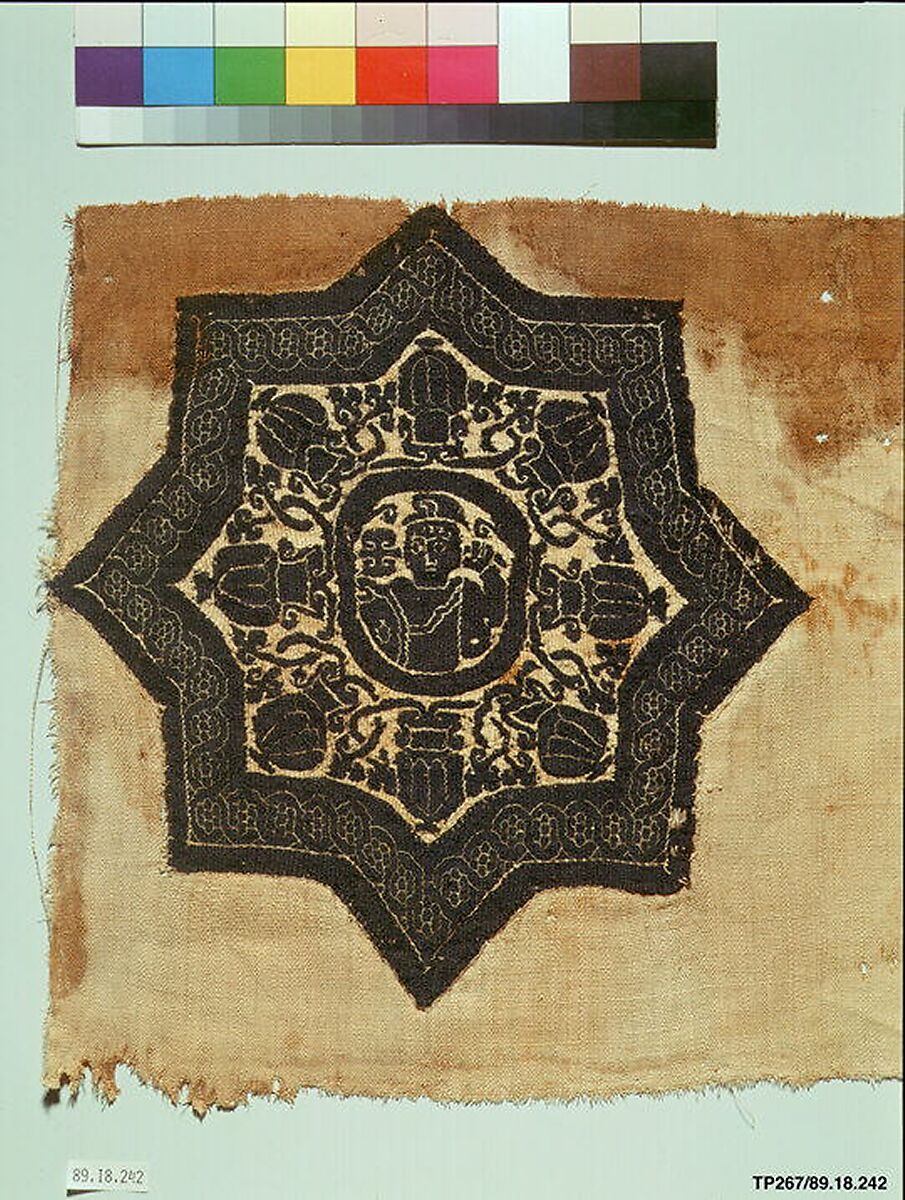Fragment with an Eight-Pointed Star Containing a Warrior, Wool, linen; plain weave, tapestry weave