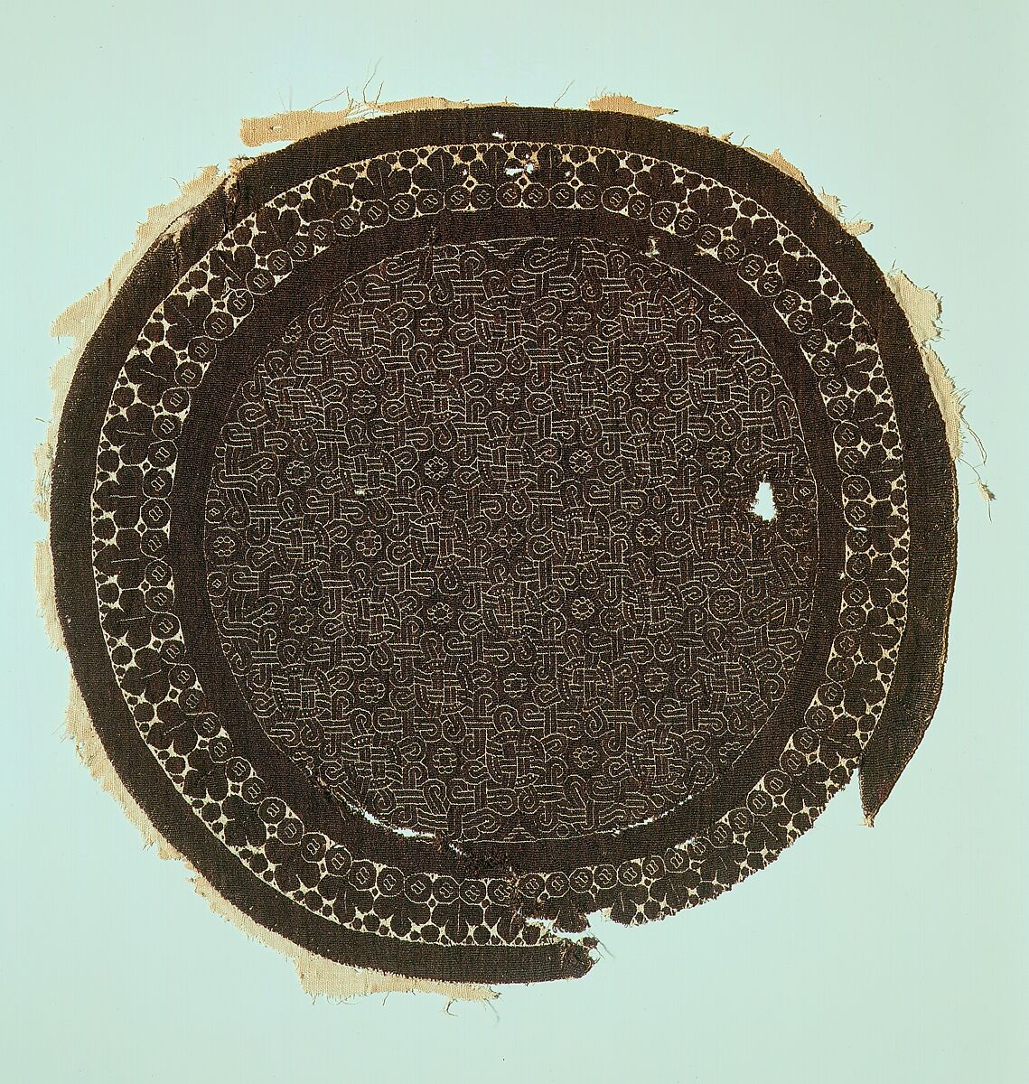 Large Interlace Roundel from a Domestic Textile or Tunic, Wool, linen; plain weave, tapestry weave 