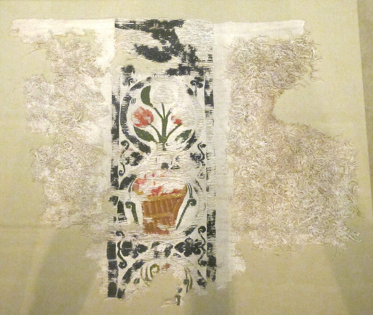 Fragment with a Band of Baskets and Plants and a Loop Pile, Wool, linen; plain weave, tapestry weave, weft loop weave