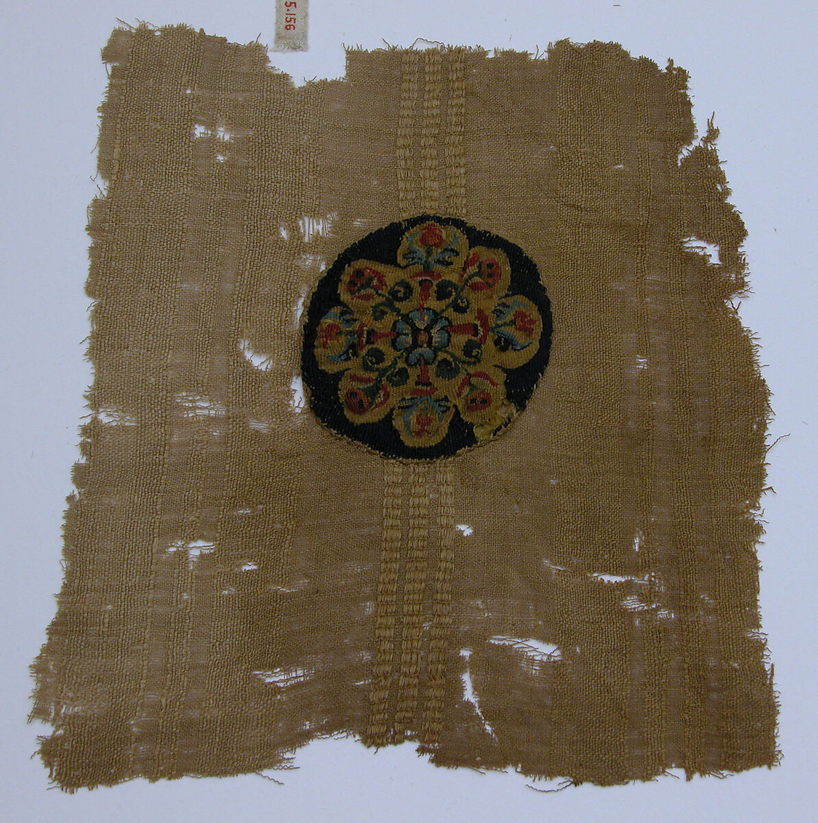 Fragment with a Composite Floral Motif Roundel, Wool, linen; plain weave, tapestry weave