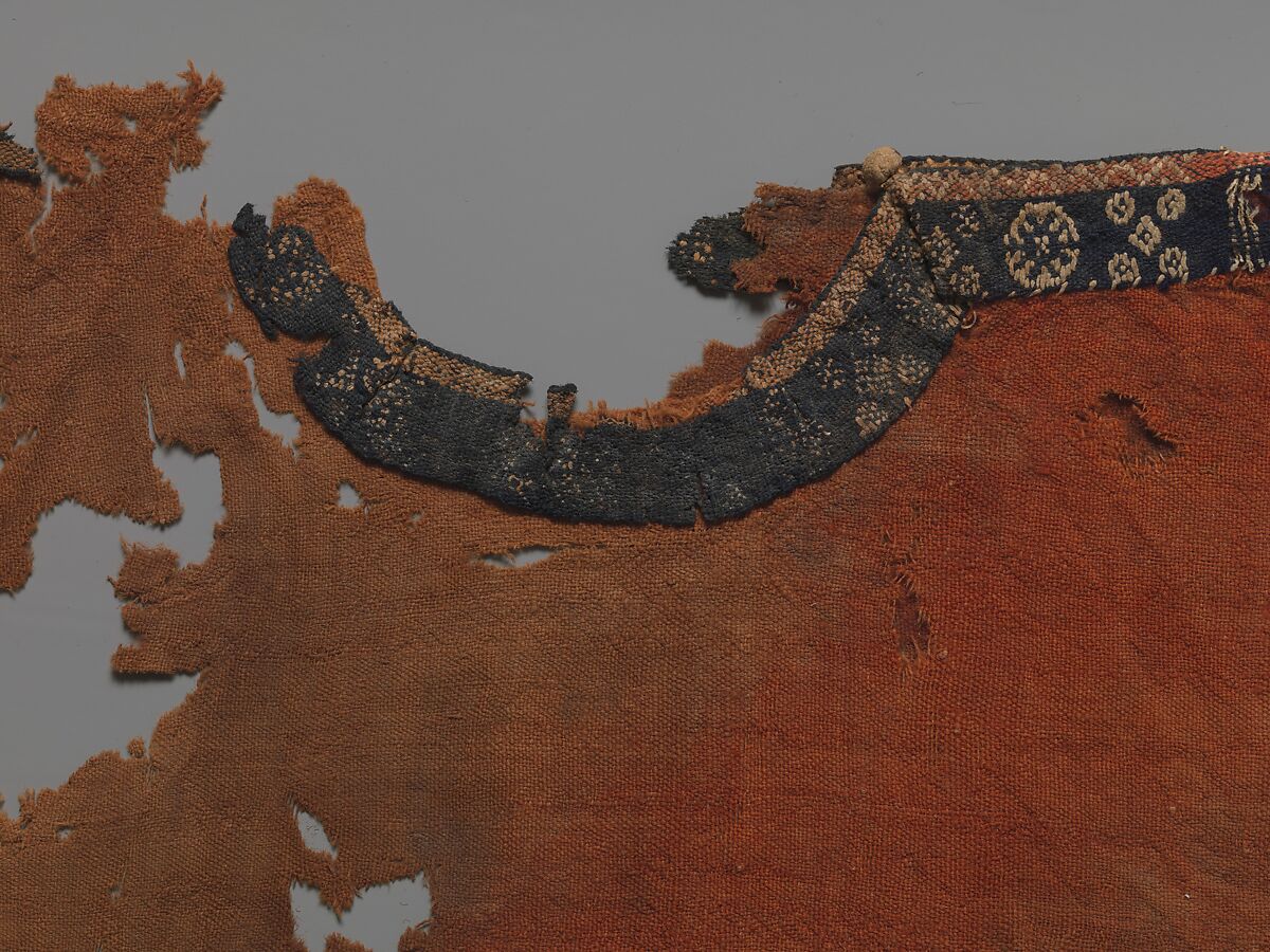 Child's Dress, Plain weave in red wool (dyed with madder); applied borders with pattern weft in blue and red wool and undyed linen