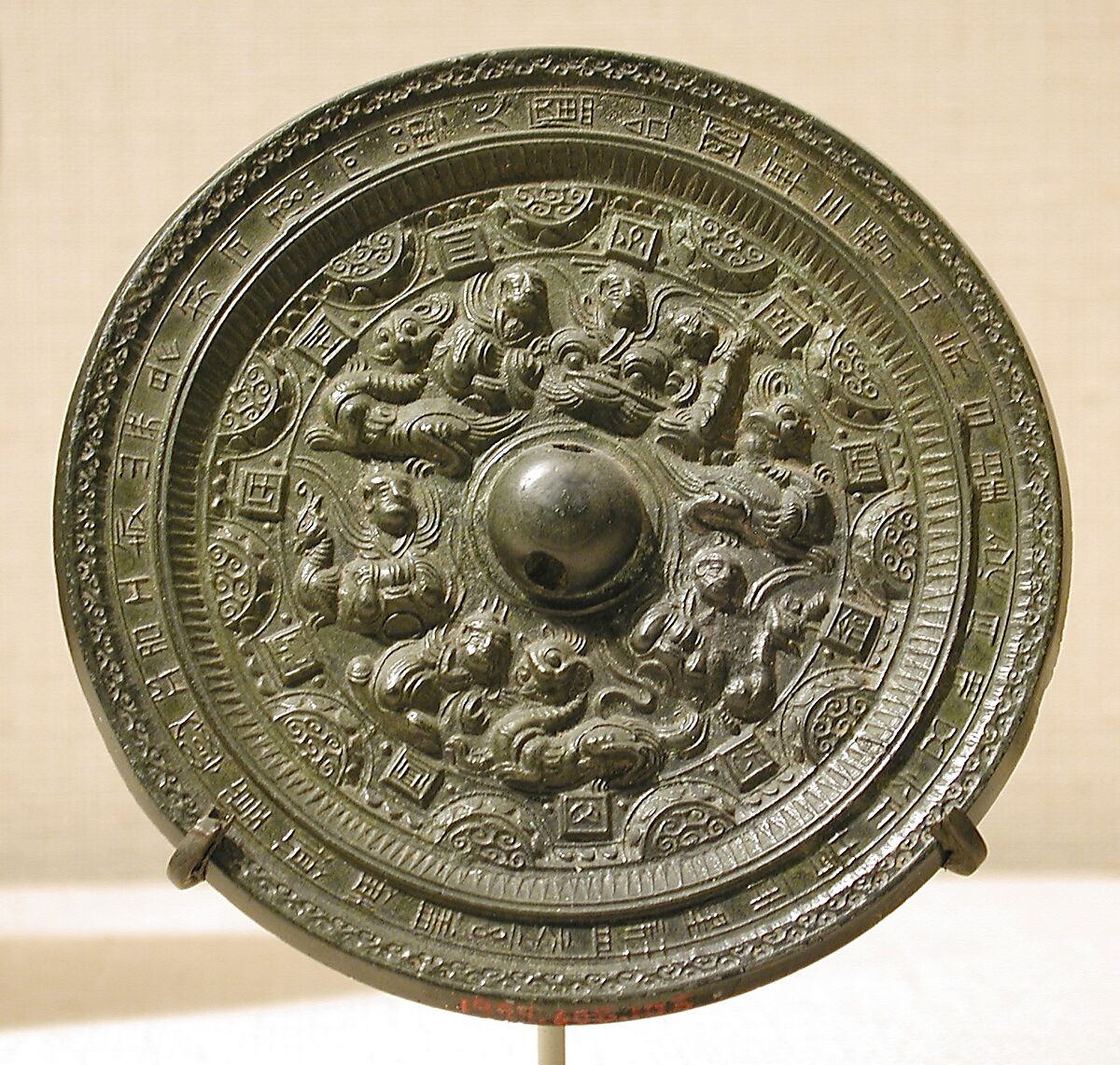 Mirror with deities and mythical creatures, Bronze, China 