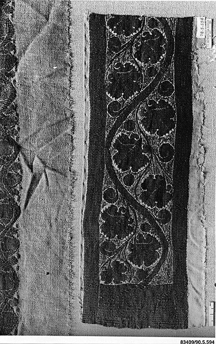 Band with Vine Scroll, Tapestry weave in purple wool (dyed with indigotin-containing dye and madder) and undyed linen on plain-weave ground of undyed linen; details in flying shuttle with undyed linen