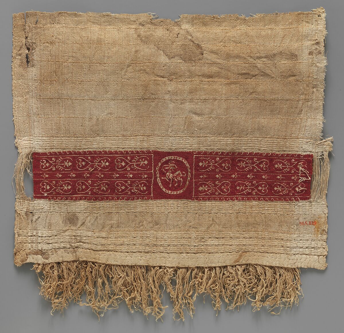 Sleeve Fragment with a Band Decorated with an Animal, Tapestry weave in red wool (dyed with madder) and undyed linen on plain-weave ground of undyed linen; details in flying shuttle in undyed linen; weft loop pile with undyed linen 