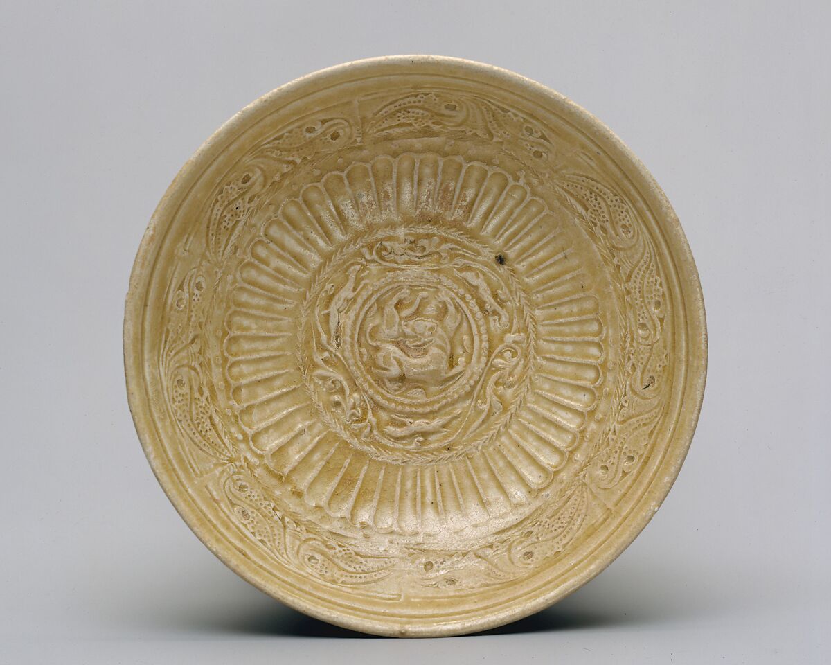 Dish, Stoneware with relief and impressed decoration under celadon glaze (Northern ware), China