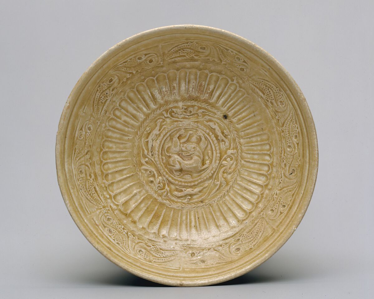 Dish, Stoneware with relief and impressed decoration under celadon glaze (Northern ware), China 