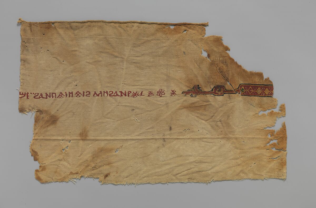 Three Fragments with a Coptic Inscription, Tapestry weave in polychrome and undyed wool on plain-weave ground of undyed wool; a row of stitches in undyed wool below the top edge