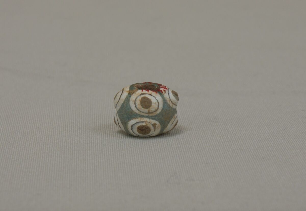 Eye Bead, Glass with blue, brown and white decoration, China 