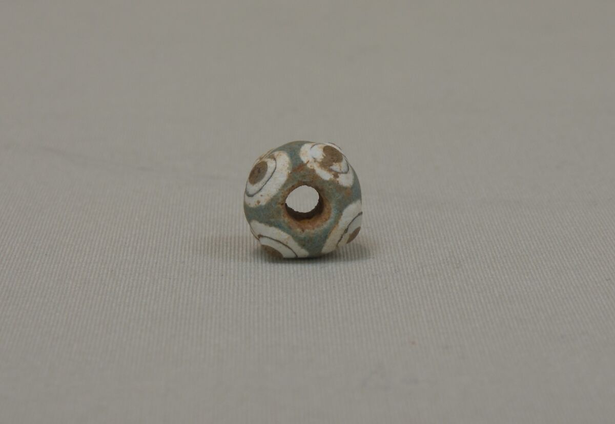 Eye Bead, Glass with blue, brown and white decoration, China