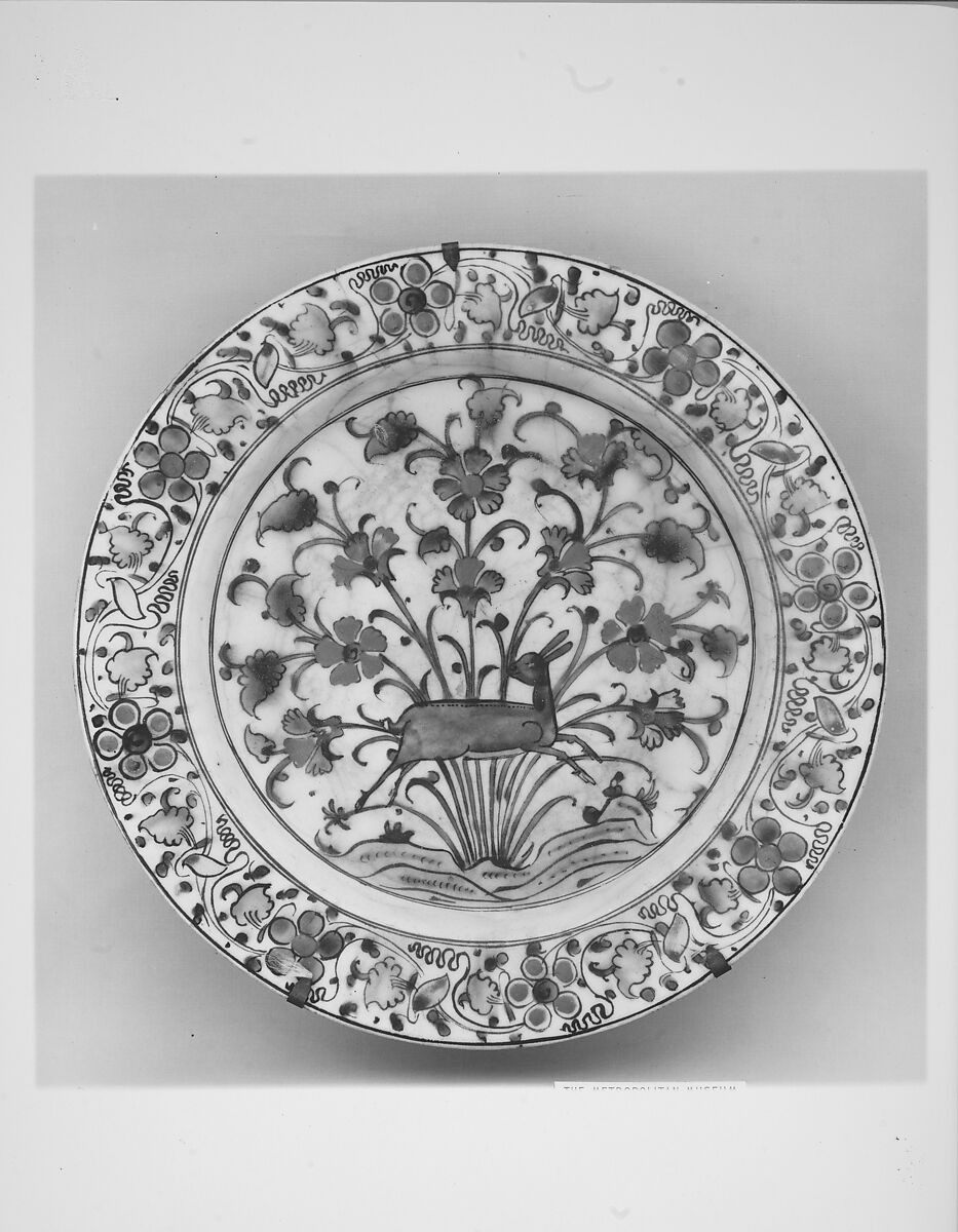 Dish, Stonepaste; underglaze painted in black, blue, and green with red slip