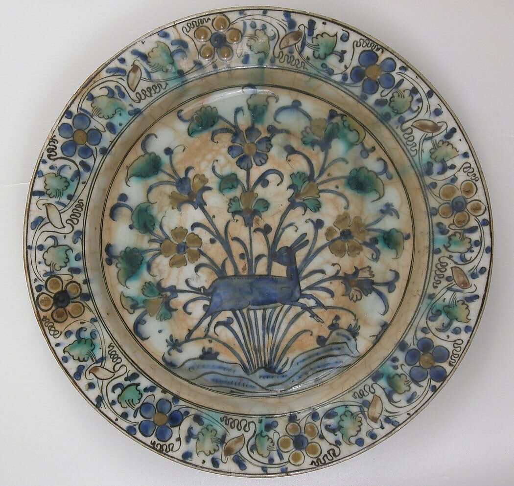 Dish, Stonepaste; underglaze painted in black, blue, and green with red slip