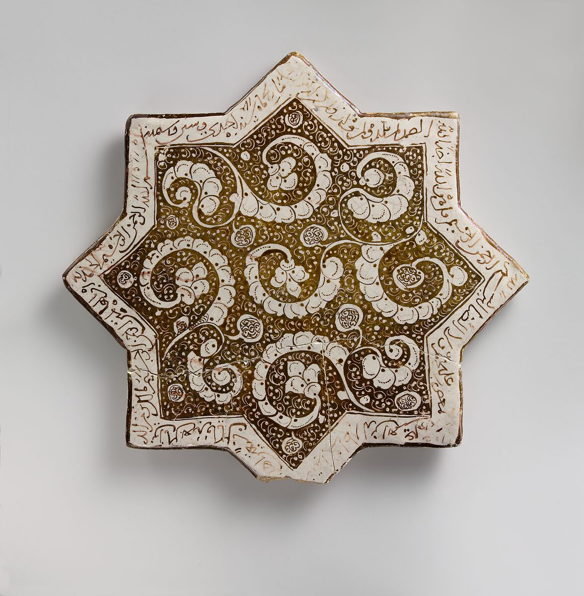 Star-Shaped Tile, Stonepaste; luster-painted on opaque white glaze