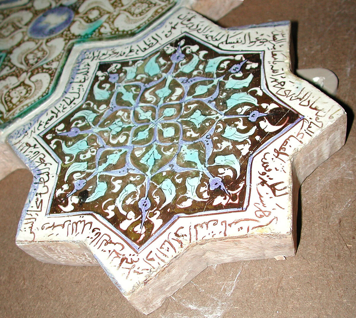 Eight-Pointed Star-Shaped Tile, Stonepaste; inglaze painted in blue, luster-painted on opaque white glaze