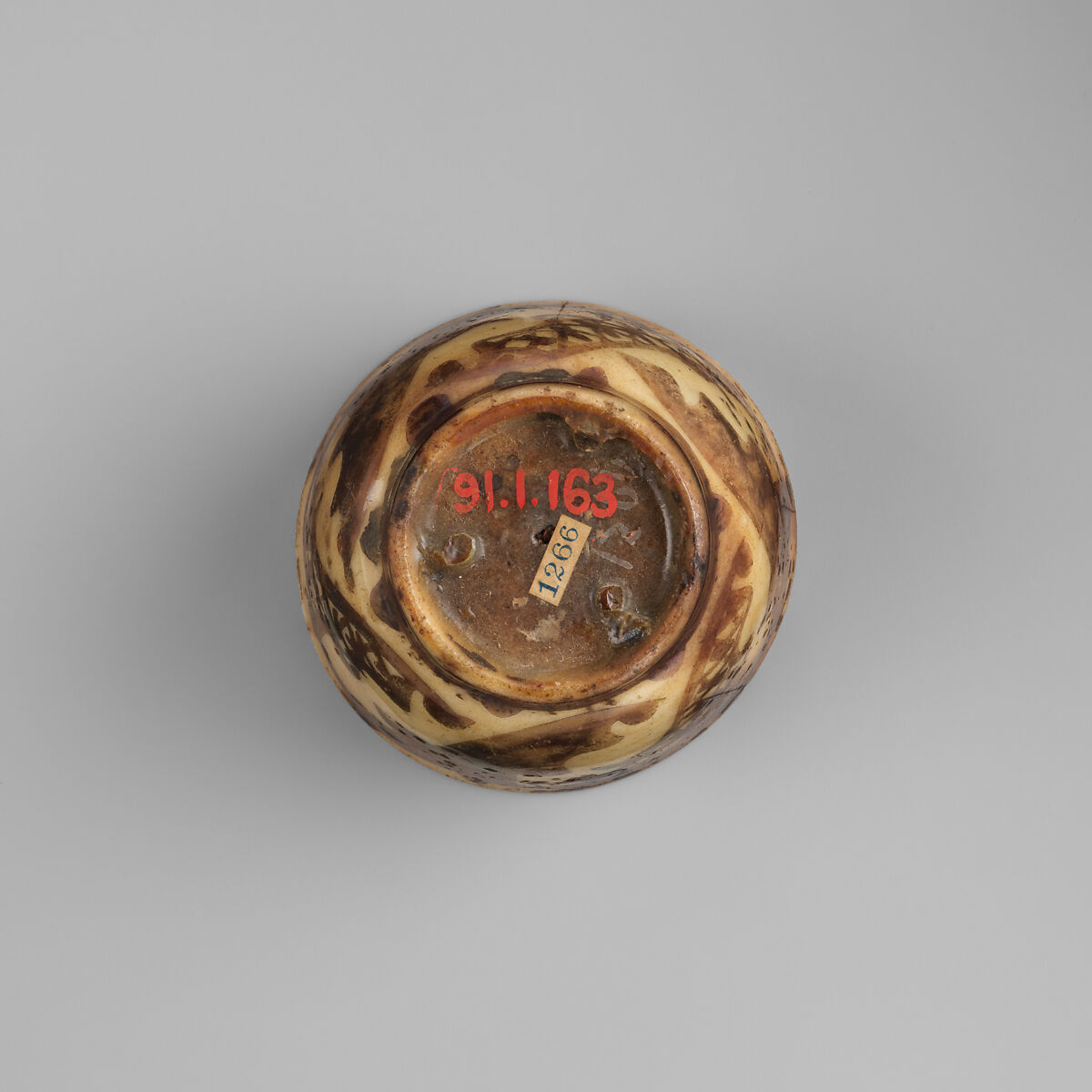Cup, Stonepaste; luster-painted on opaque white glaze under transparent colorless glaze