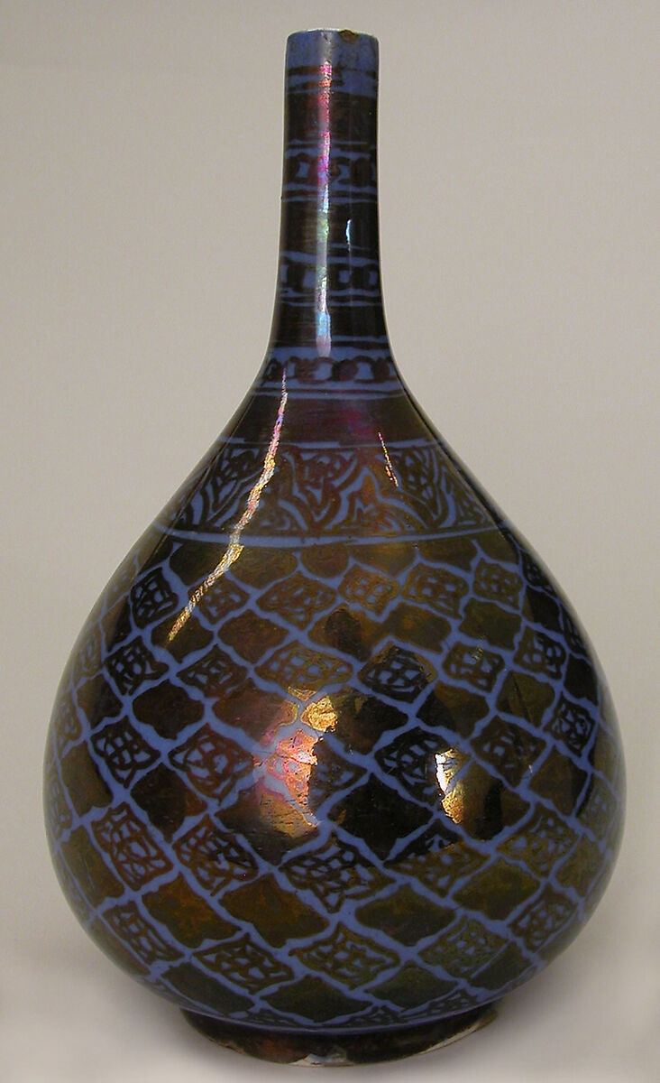 Bottle, Stonepaste; luster-painted on opaque blue glaze under transparent colorless glaze