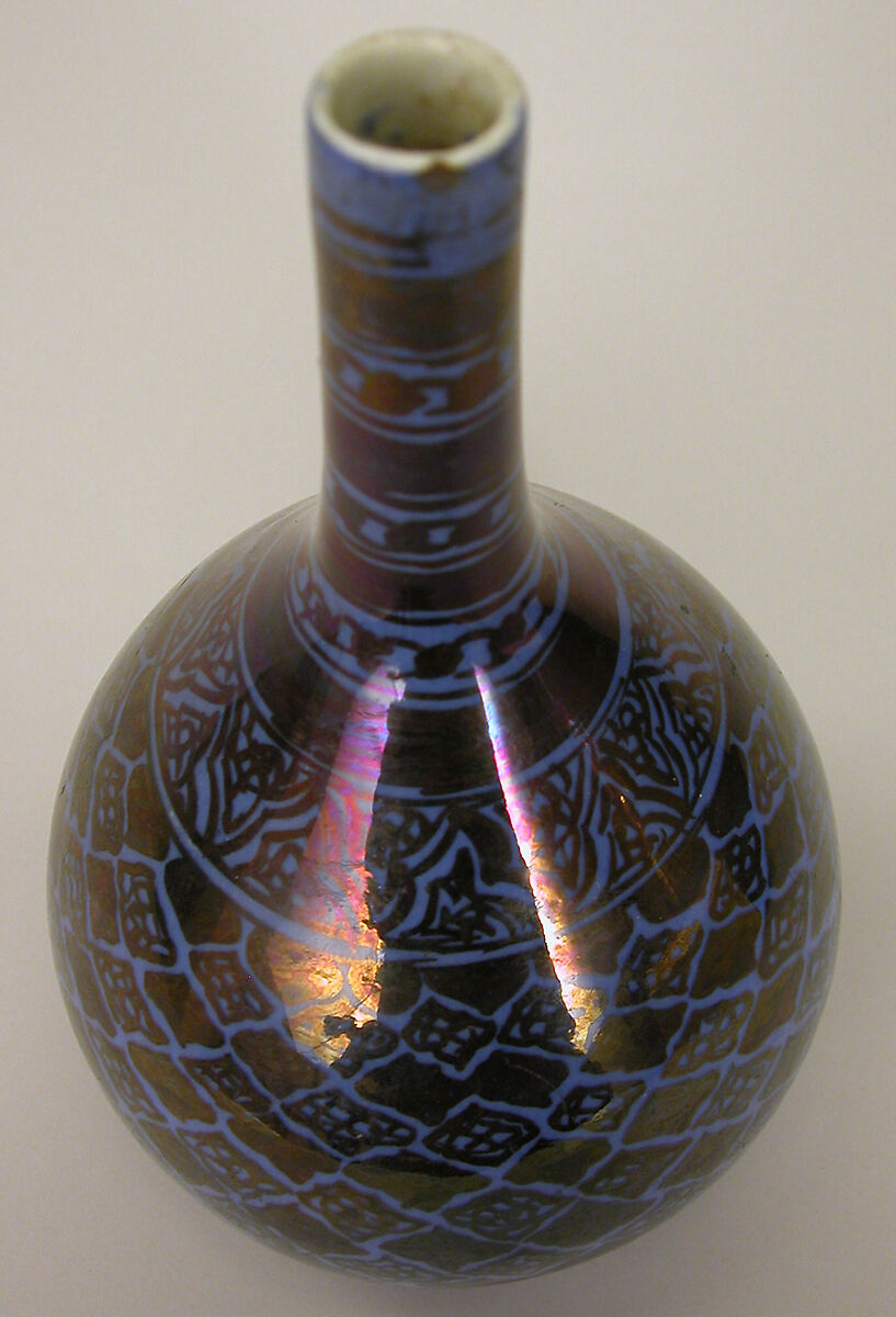 Bottle, Stonepaste; luster-painted on opaque blue glaze under transparent colorless glaze