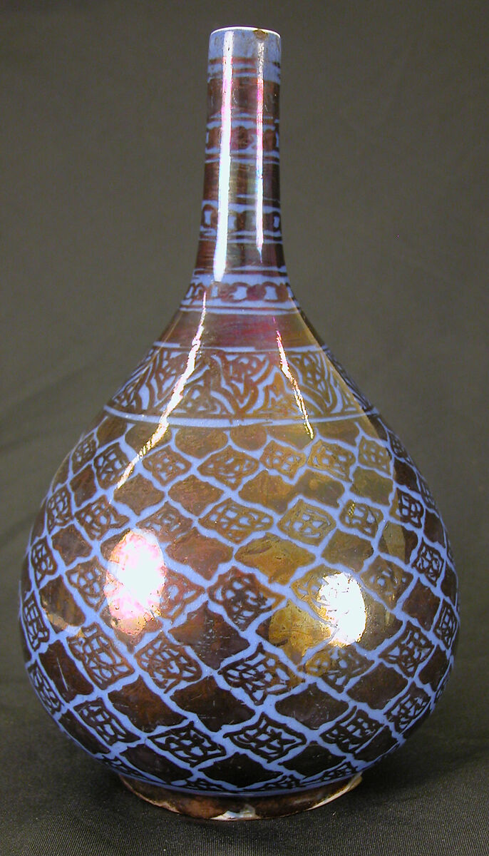 Bottle, Stonepaste; luster-painted on opaque blue glaze under transparent colorless glaze