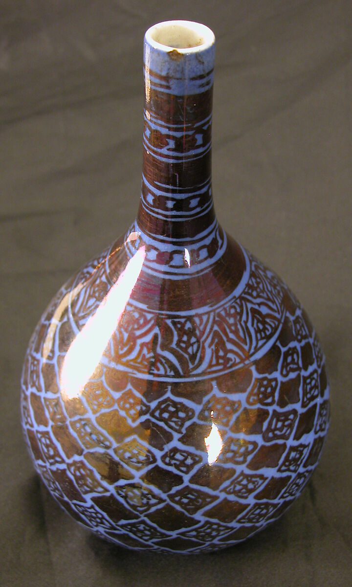 Bottle, Stonepaste; luster-painted on opaque blue glaze under transparent colorless glaze