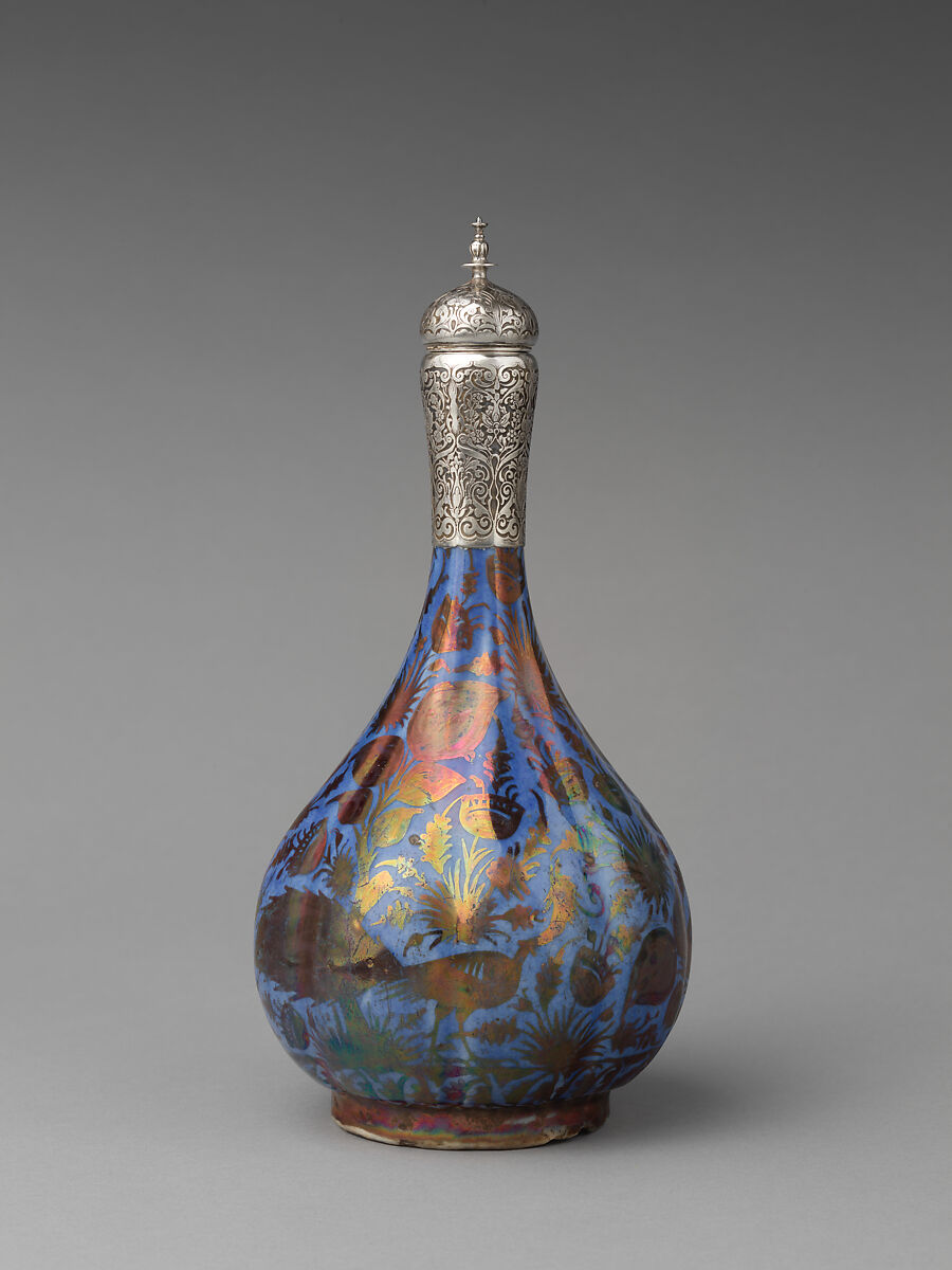 Bottle, Stonepaste; luster-painted on opaque blue glaze, with silver fitting