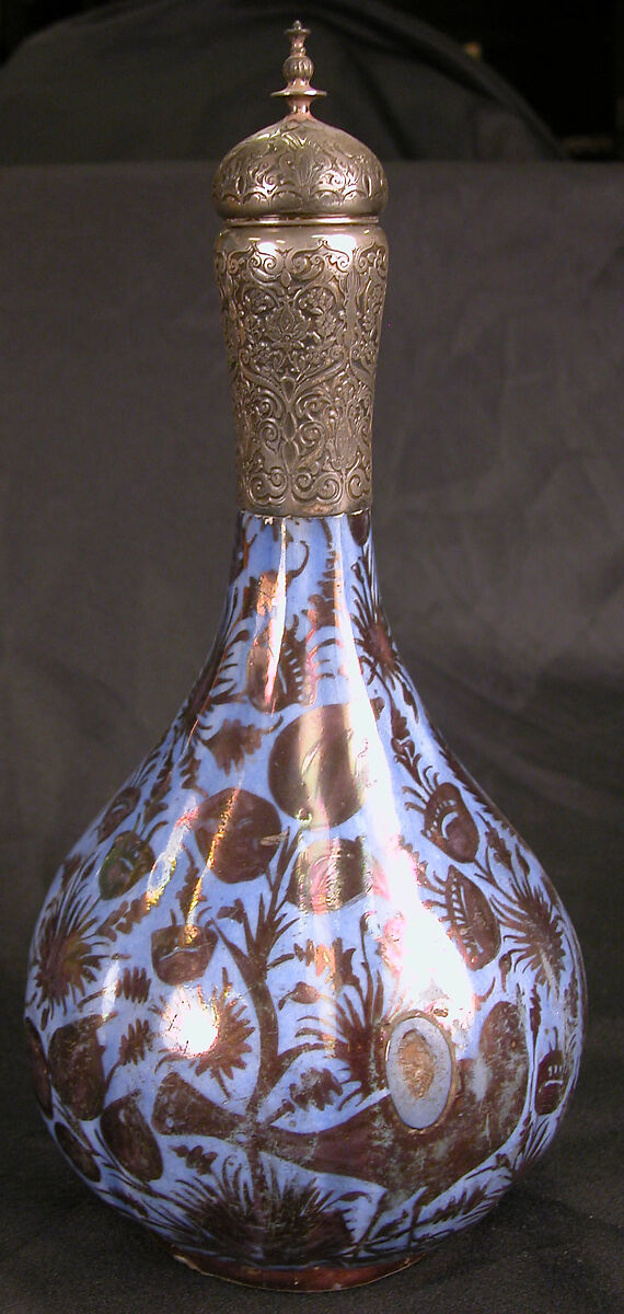 Bottle, Stonepaste; luster-painted on opaque blue glaze, with silver fitting