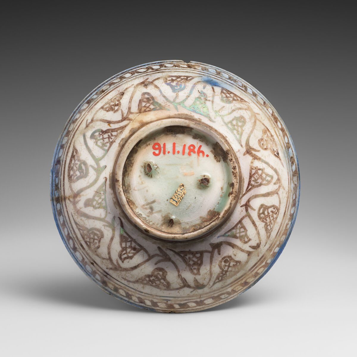 Dish, Stonepaste; luster-painted on opaque blue and white glaze under transparent colorless glaze