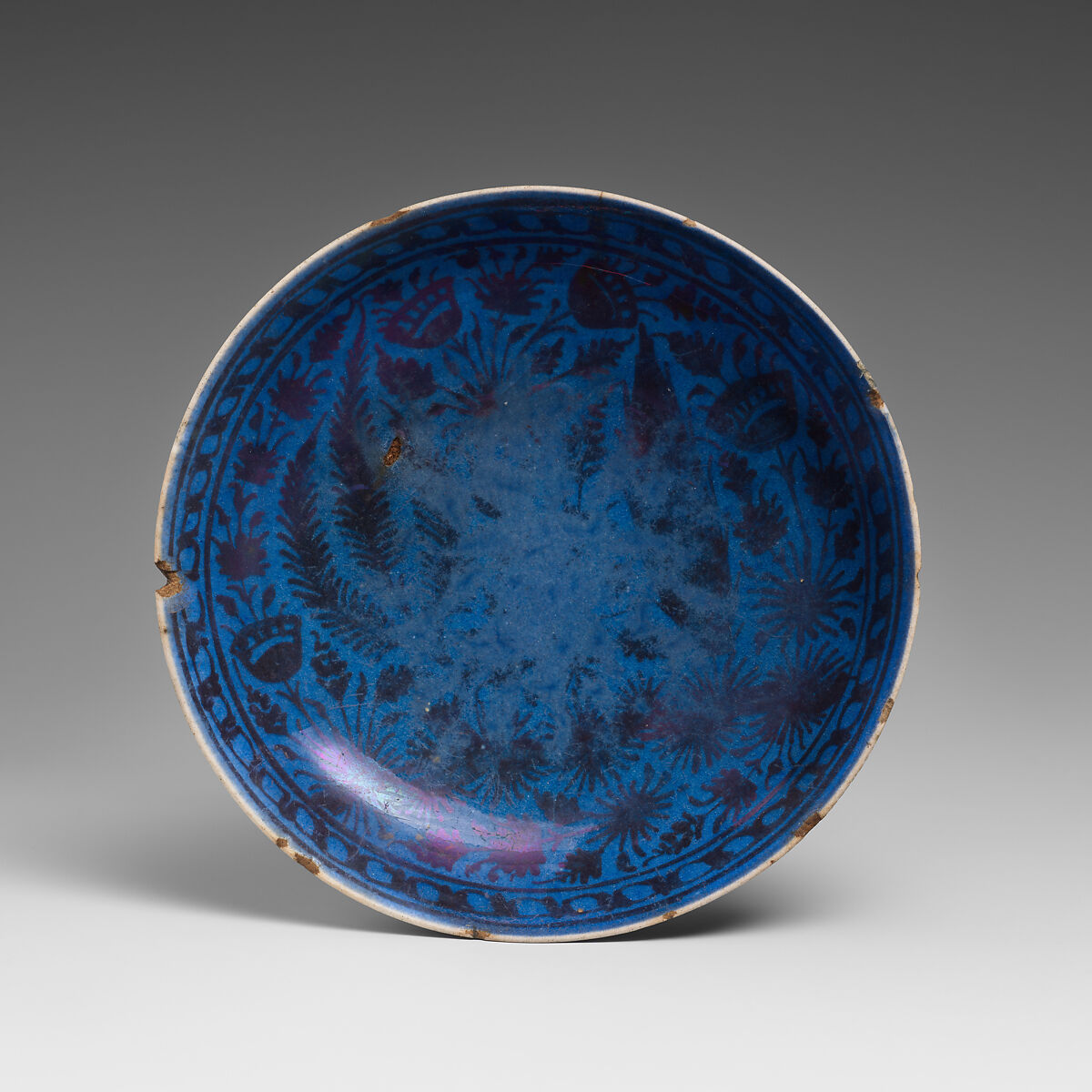 Dish, Stonepaste; luster-painted on opaque blue and white glaze under transparent colorless glaze