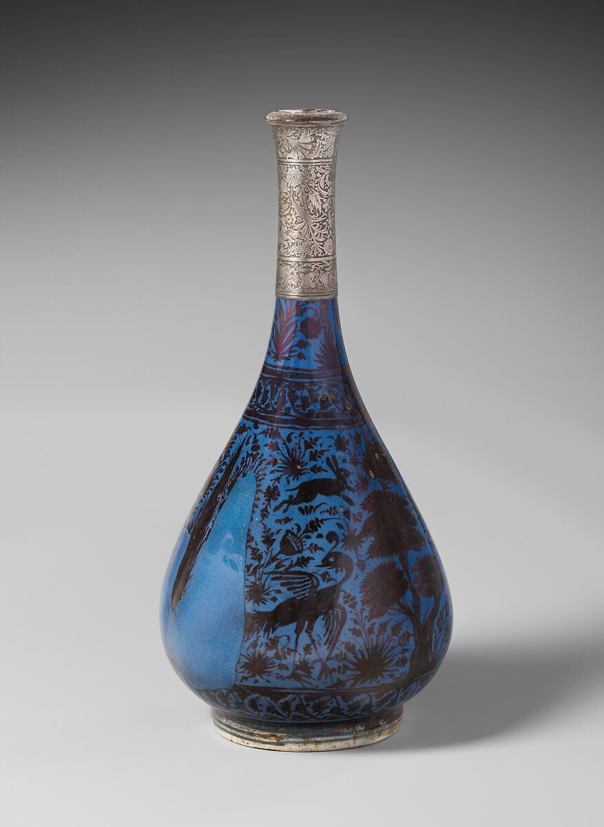 Bottle Depicting a Peacock in Foliage, Stonepaste; luster-painted on blue glaze under transparent glaze; silver mount