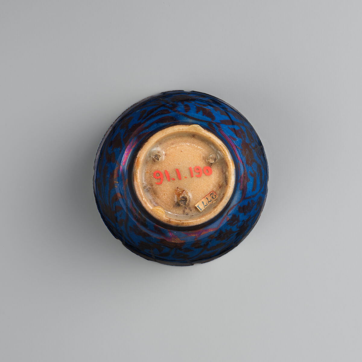 Cup, Stonepaste; luster-painted on opaque blue glaze (exterior) and white glaze (interior)