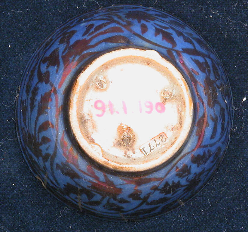 Cup, Stonepaste; luster-painted on opaque blue glaze (exterior) and white glaze (interior)