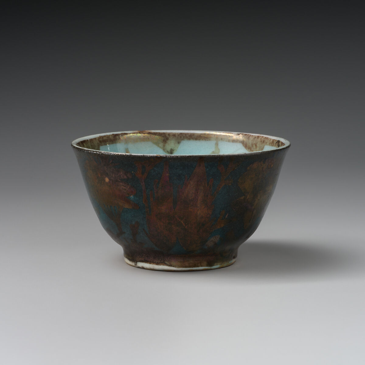 Cup, Stonepaste; luster-painted on opaque light blue glaze and white glaze (rim)