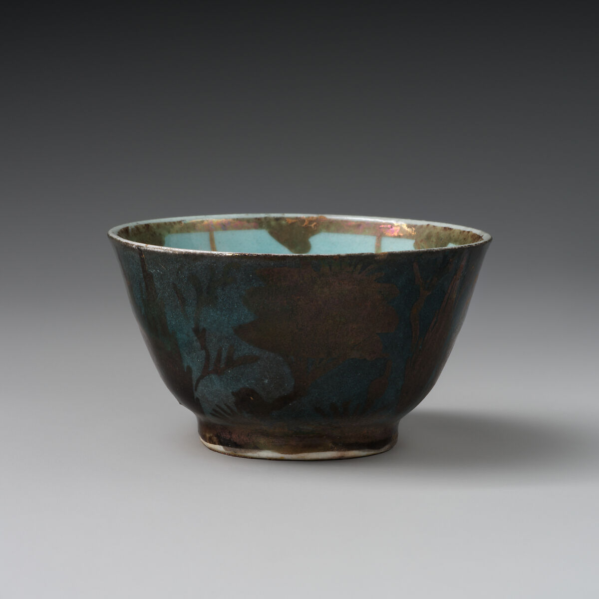 Cup, Stonepaste; luster-painted on opaque light blue glaze and white glaze (rim) 