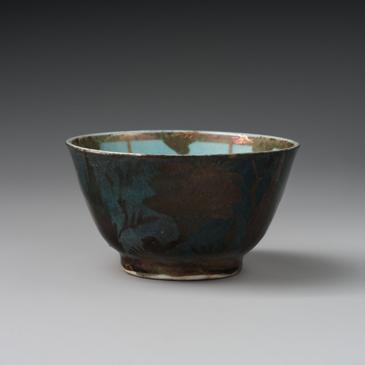 Cup, Stonepaste; luster-painted on opaque light blue glaze and white glaze (rim)
