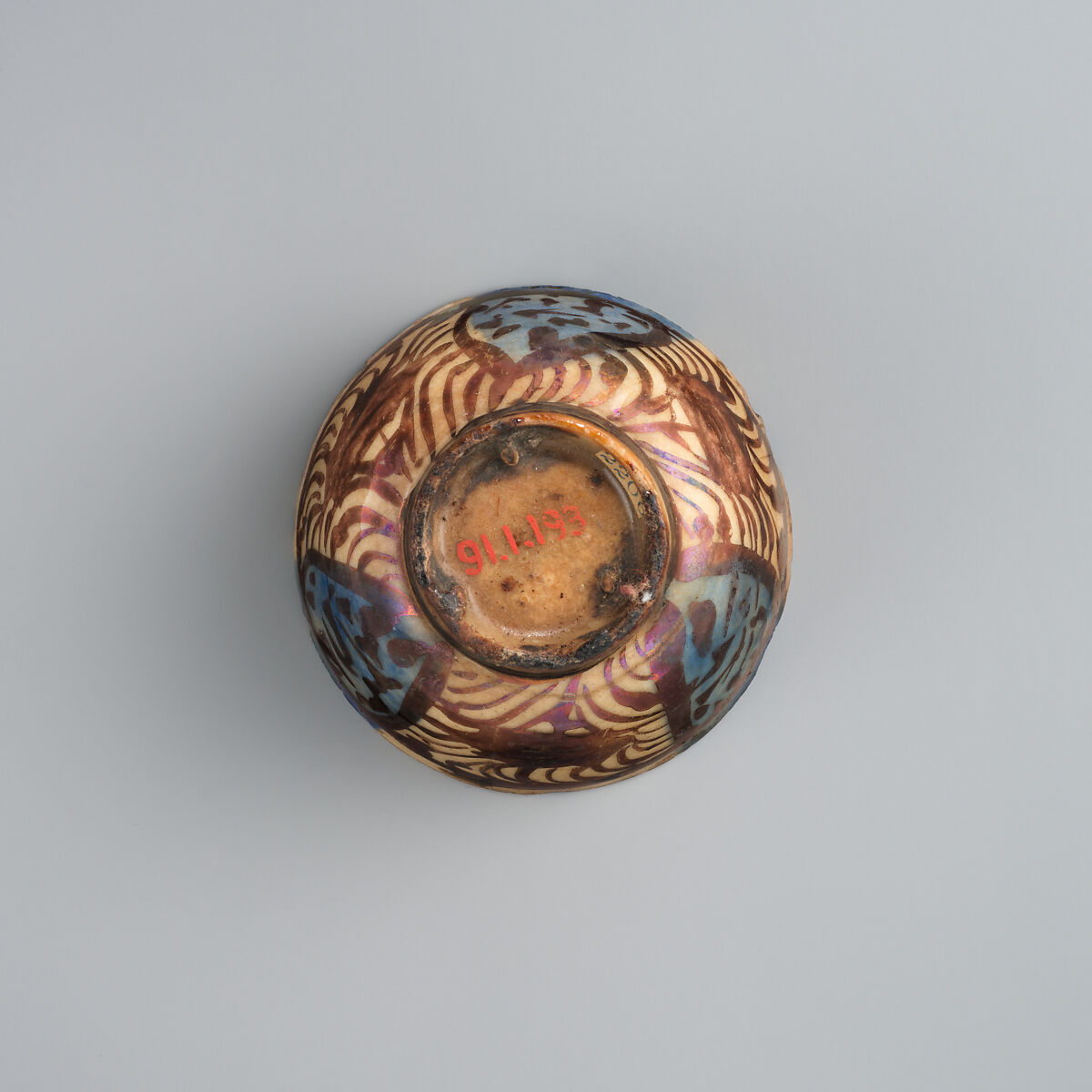 Cup, Stonepaste; luster-painted on opaque blue and white glaze under transparent colorless glaze