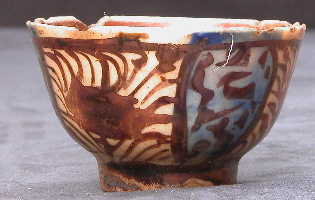 Cup, Stonepaste; luster-painted on opaque blue and white glaze under transparent colorless glaze