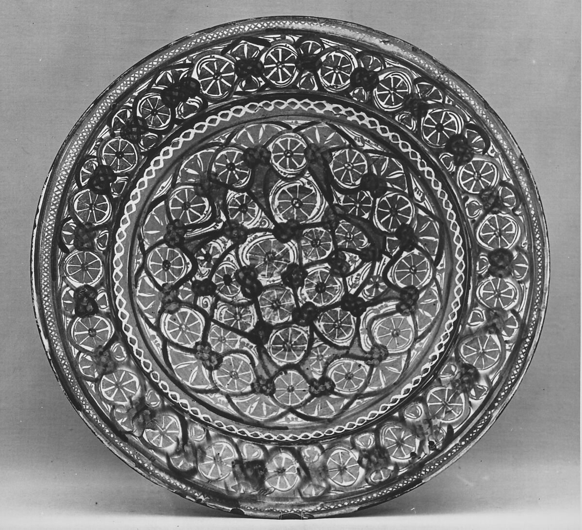 Plate, Earthenware; tin-glazed and luster-painted