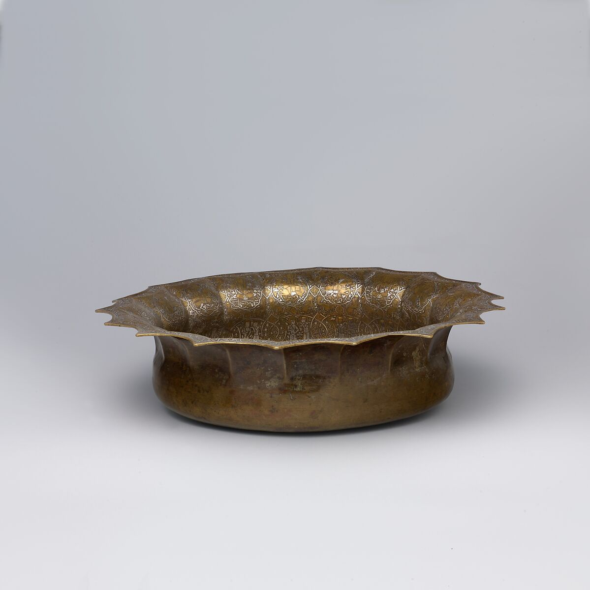 Basin with Figural Imagery, Brass; raised, engraved, and inlaid with silver and gold