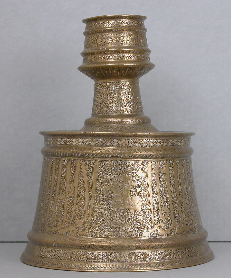 Candlestick with Horsemen and Arabic Inscriptions Conveying Good Wishes and Blessings Upon the Sultan, Brass; cast, engraved, and originally inlaid with silver