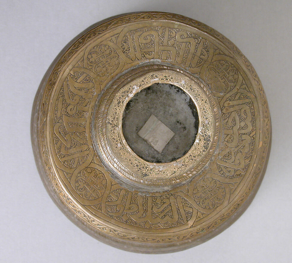 Candlestick with Horsemen and Arabic Inscriptions Conveying Good Wishes and Blessings Upon the Sultan, Brass; cast, engraved, and originally inlaid with silver