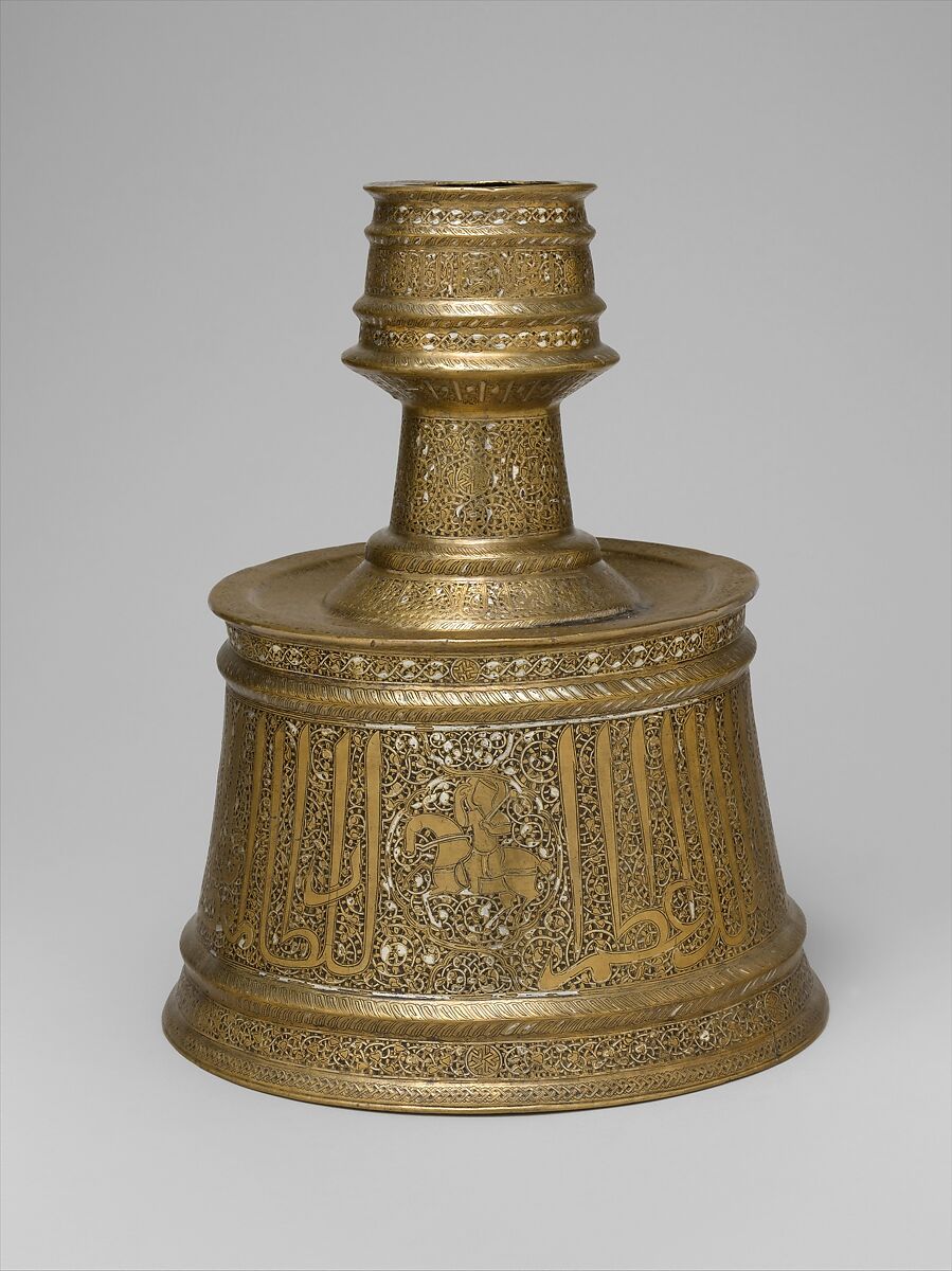 Candlestick with Horsemen and Arabic Inscriptions Conveying Good Wishes and Blessings Upon the Sultan, Brass; cast, engraved, and originally inlaid with silver 