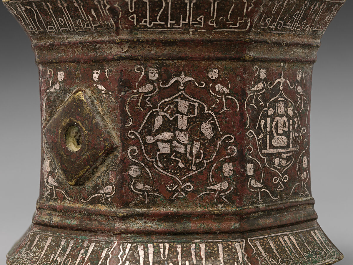 Mortar and Pestle made for Abu Bakr 'Ali Malikzad al-Tabrizi, Bronze; inlaid with silver and black compound