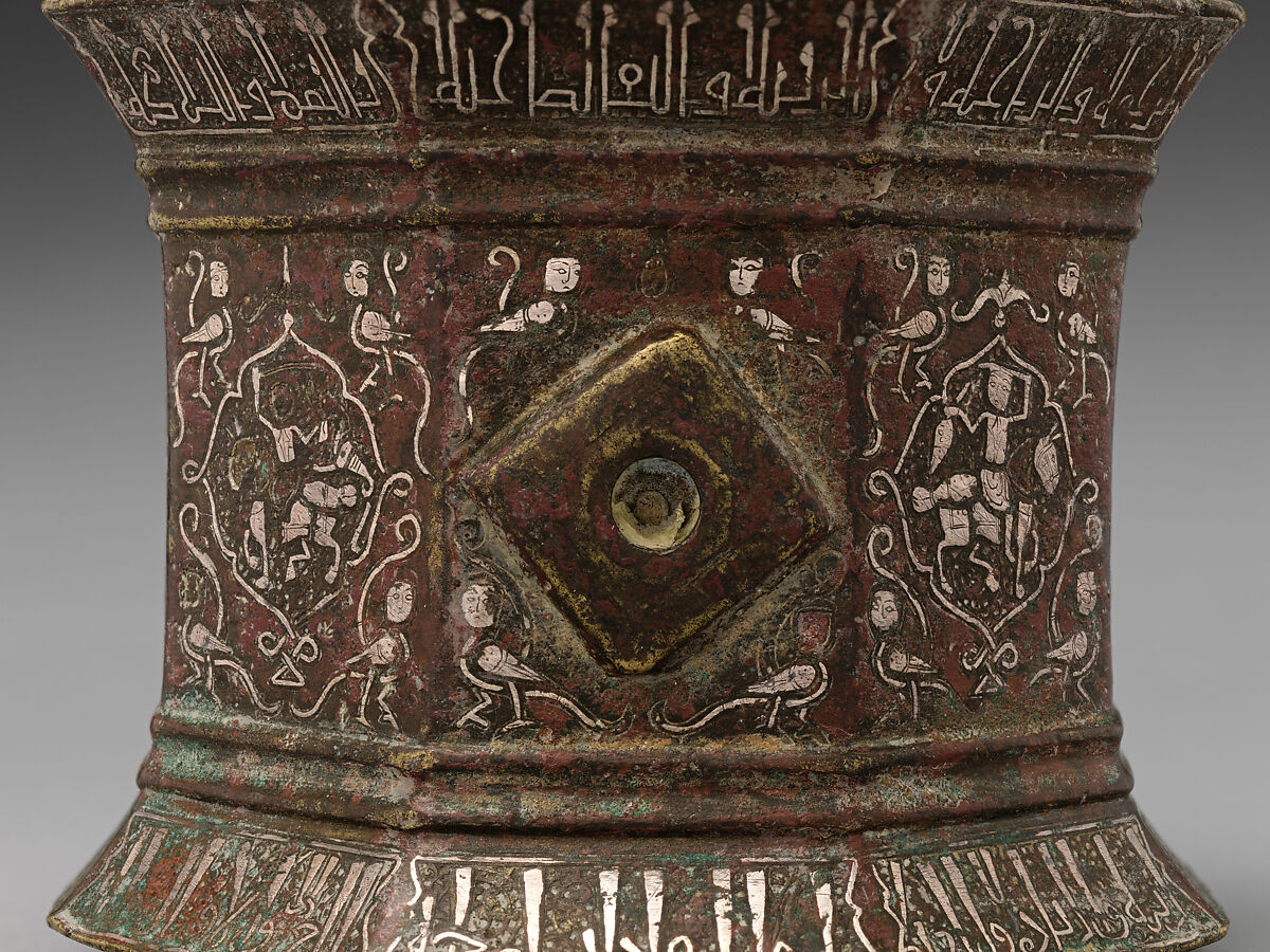 Mortar and Pestle made for Abu Bakr 'Ali Malikzad al-Tabrizi, Bronze; inlaid with silver and black compound