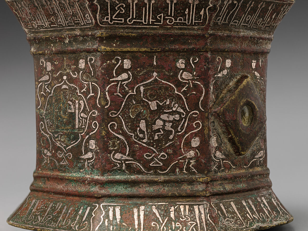 Mortar and Pestle made for Abu Bakr 'Ali Malikzad al-Tabrizi, Bronze; inlaid with silver and black compound